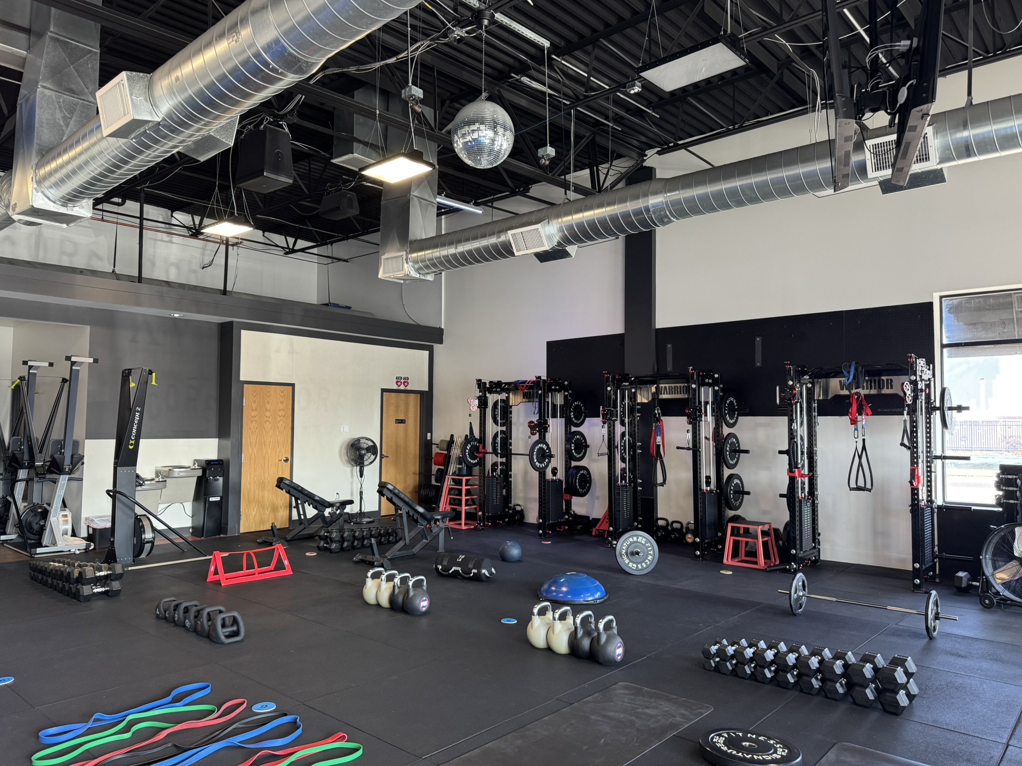 Friends working out together at CORE XV